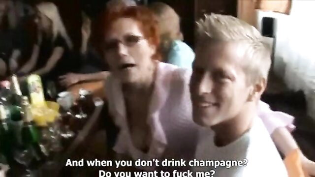 Redhead MILF in pink asks 'Do you want to fuck me?' to blond guy at orgy party
