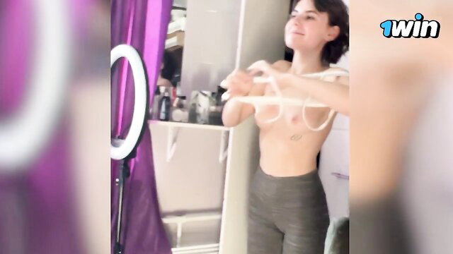 Brunette fitness babe topless in bra, teasing gym angel tease