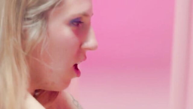 Blonde Gia Green profile view open mouth nude tits closeup