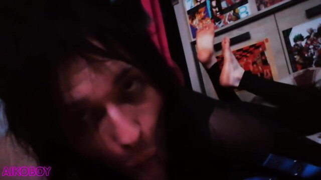 AIKOBOY goth crossdresser foot tease in fishnets on screen