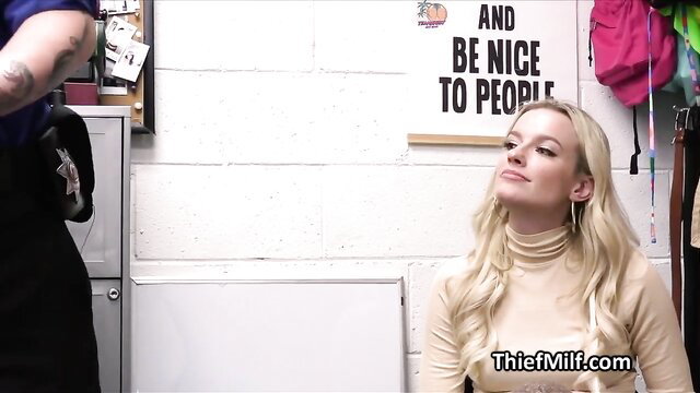 Blonde cougar milf in turtleneck smiles in shoplift bust scene