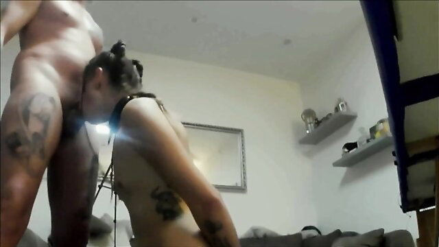 Tattooed muscular man dominates tattooed submissive woman in hard bondage fuck