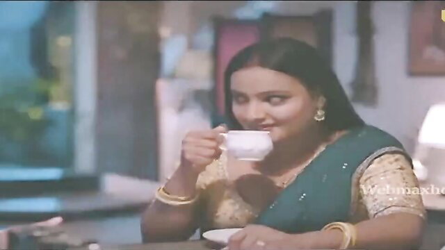 Indian MILF in green saree sips tea seductively, Ullu series