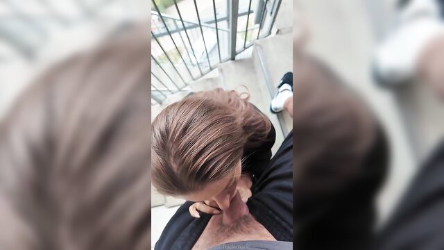 Kinky amateur MILF kissing chest on balcony POV