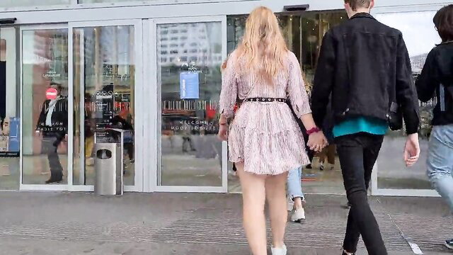 Blonde teen in short pink dress walks with boys, voyeur upskirt booty view