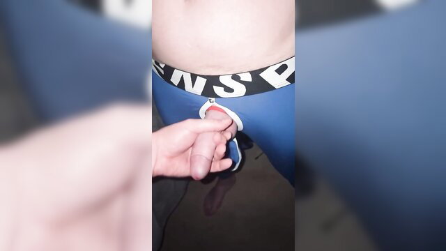 Fetishladd in open fly blue Calvin Klein briefs, hand teasing cock hole