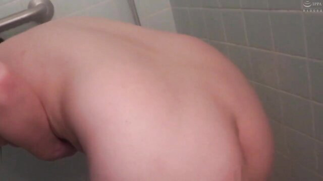 Chubby Japanese MILF bent over in shower exposing fat ass