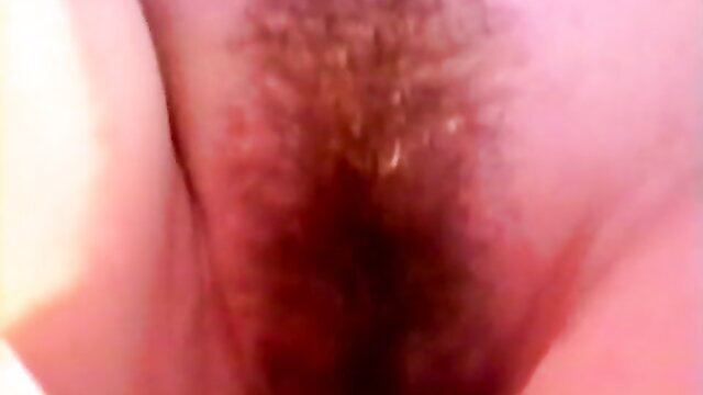 Closeup of hairy mature pussy at nudist camp swingers party