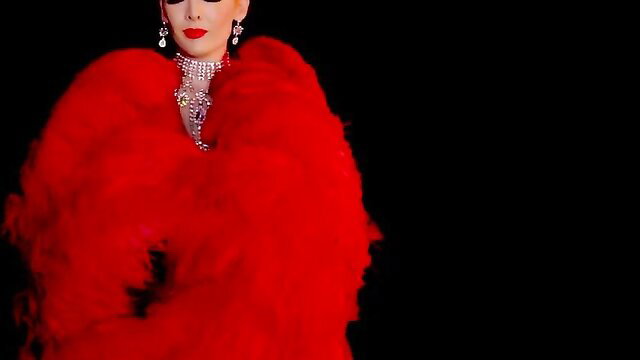 Hot mommy shines in slutty red burlesque feather costume