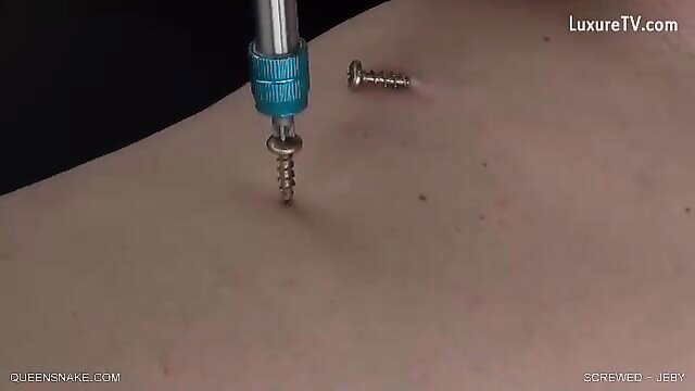 Queen Snake Jeby screwed with drill screwing into belly skin