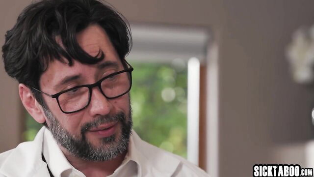 Katrina Colt in glasses and white shirt, devoted to science