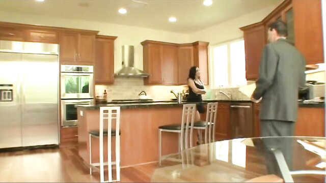 Veronica Rayne sexy MILF in tight black dress in kitchen