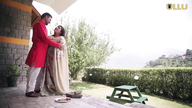 Indian chubby MILF in saree embraced by man in romantic outdoor scene