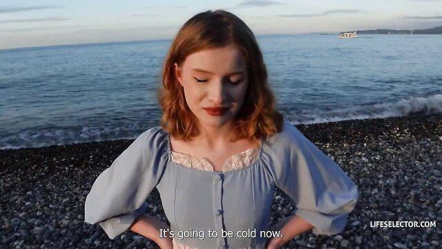 Diana Rider in blue dress on beach saying it'll be cold POV tease