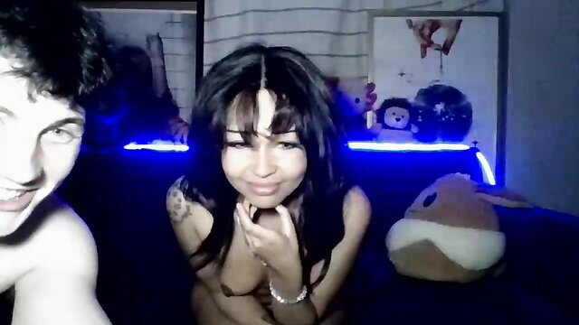 Milkandhoneybby topless with guy on Chaturbate, petite Asian smiles nude