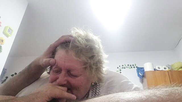 Granny gives intense facefuck blowjob closeup