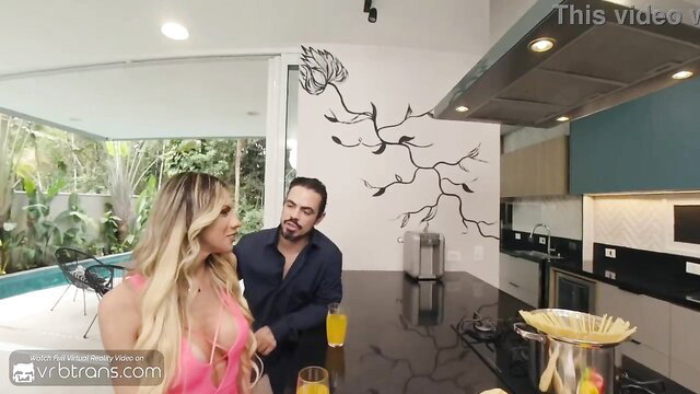 Blonde Brazilian trans girlfriend in pink lingerie sucks cock at dinner