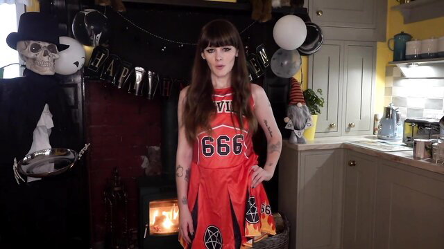 Sydney Harwin in sexy devil Halloween cheerleader costume