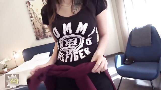 Asian tattooed thick babe in Tommy Hilfiger top holding purple sweater, teasing strip