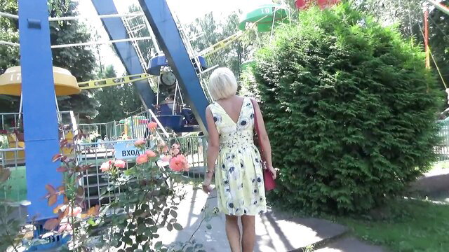 Blonde MILF in sundress at playground flashing pussy
