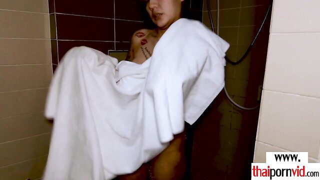 Thai mommy Noi wrapped in towel in shower prepping slit for BWC