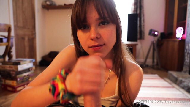 Maya Kayagaia grabs cock closeup in living room blowjob