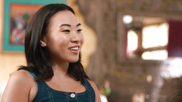 Kimmy Kimm smiling in denim dress, hot Asian star