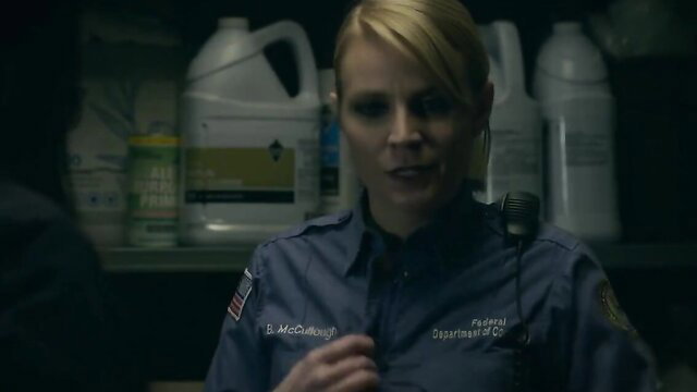 Laura Prepon as Officer McCusky in OITNB uniform, blonde cop stare