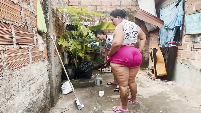Thick Brazilian MILF in tight pink shorts bending over huge ass at work