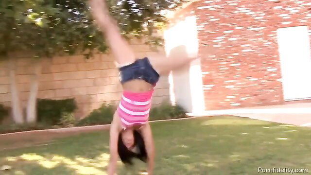 Amia Miley doing hot handstand in tiny shorts and pink top