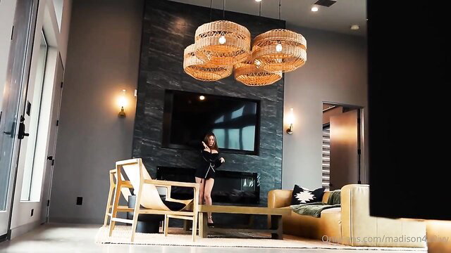 Madison Ivy hot MILF standing sexy in black dress solo