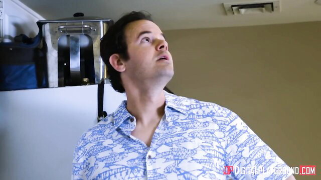 August Ames in fish print shirt looking up teasingly