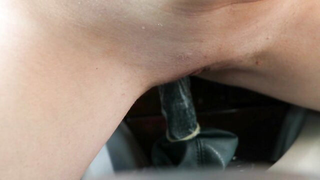 AnnaHomeMix masturbates with car gearshift lever insertion