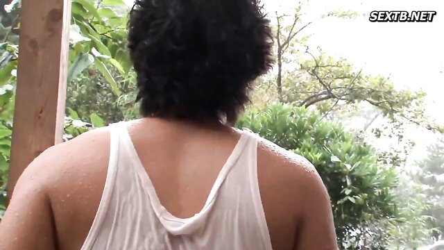 Japanese MILF back view in wet white tank top outdoors