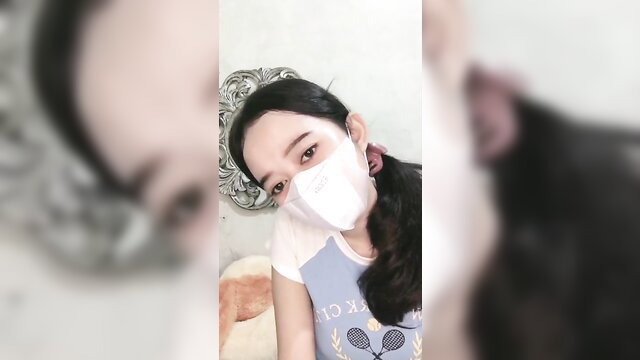 Asian Redd cute masked selfie in tennis top, amateur Asian solo tease