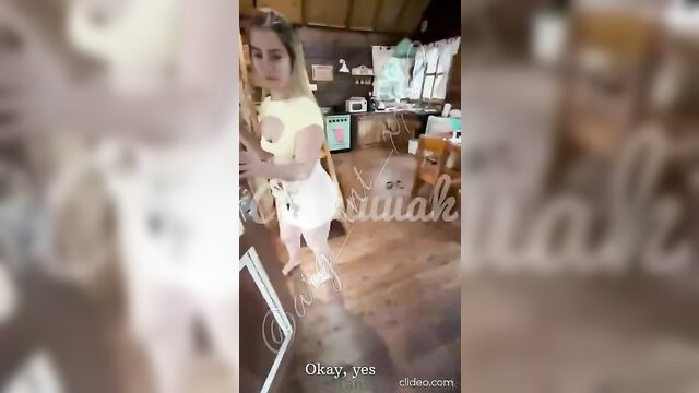 Blonde Argentine slut in tiny white skirt and top, bending over in kitchen