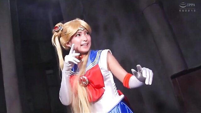 Blonde Sailor Moon cosplay girl in sexy sailor fuku pose, JAV style