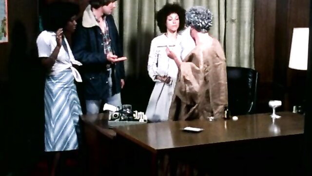 Vintage 1978 porn thumbnail: black women, white men in office flirt scene