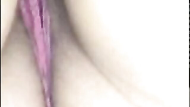 Closeup of wet shaved pink pussy lips spread open outdoors