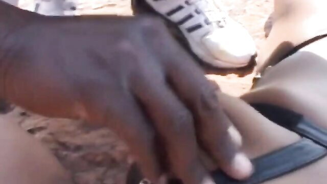 Black man spanking ethnic girl's ass outdoor punishment