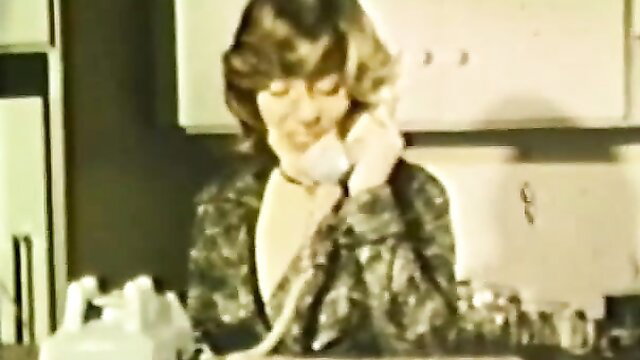 Vintage brunette MILF on phone in sheer top, hardcore adult scene