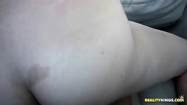 Closeup of pale girl's big white ass with handprint fucked in car
