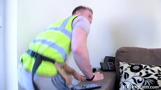 Rebecca More grabs young handyman's huge cock in hi-vis vest