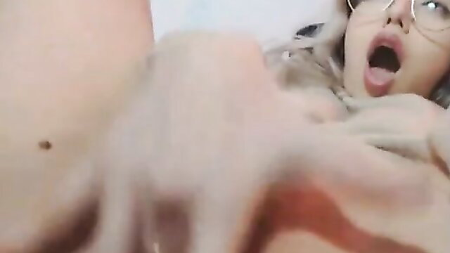 Petite blonde with glasses fingering wet pussy closeup