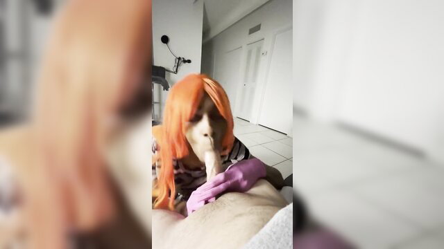 Orange wig cosplay girl in pink gloves slurping white cock sloppy