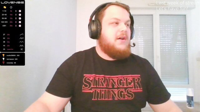 Bearded ginger guy in Stranger Things tee on gay webcam stream