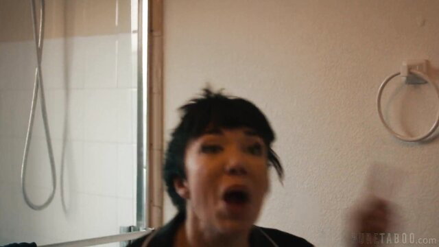 Little Puck screaming in shower, wet Asian beauty closeup