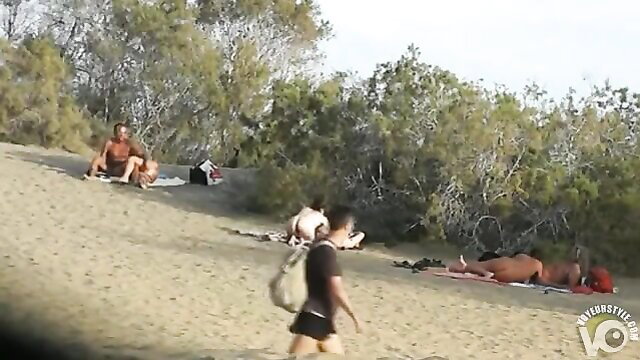 Nudist beach orgy with multiple nude couples fucking publicly
