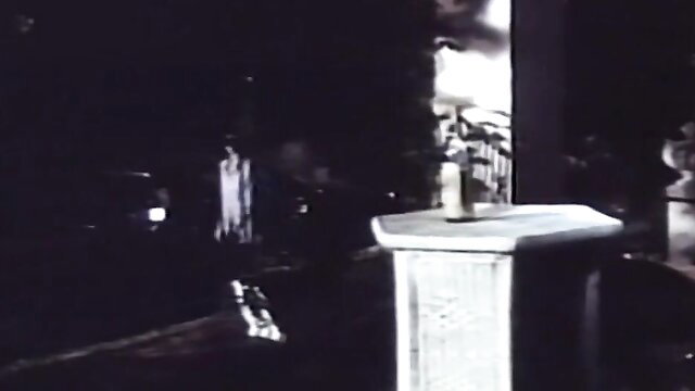 Vintage 1985 Taboo American Style 1 dimly lit erotic pedestal scene