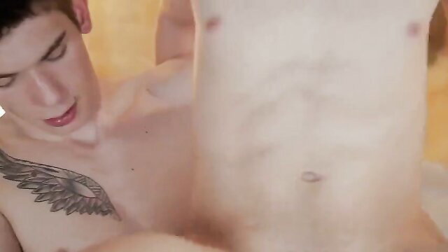 Young tattooed twink rimmed in hot gay oral sex closeup